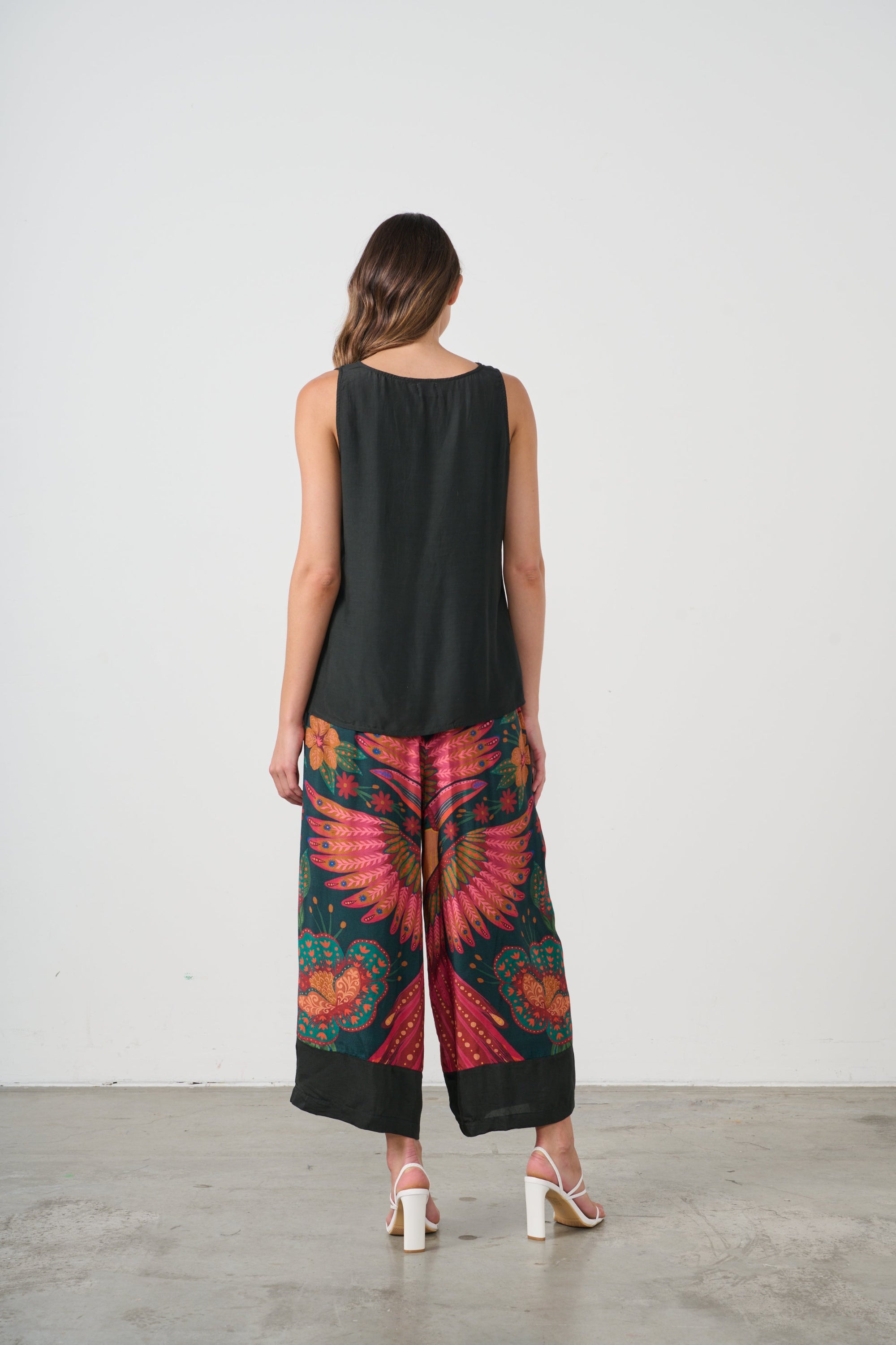 womens wide leg pant with multi toucan print worn by model back view
