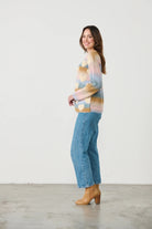 womens crew sweater pastel colours with hearts worn by model side view