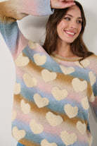 womens crew sweater pastel colours with hearts worn by model