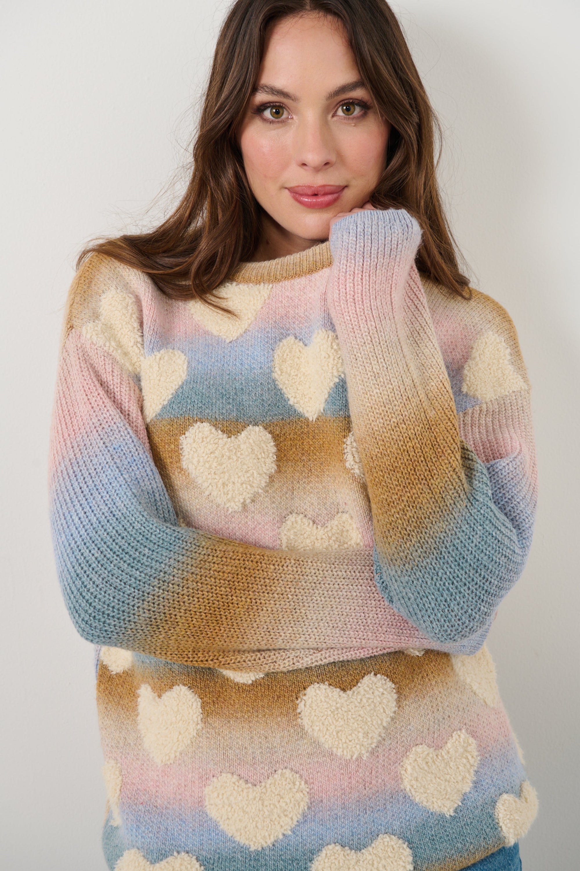 womens crew sweater pastel colours with hearts worn by model