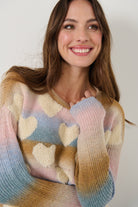 womens crew sweater pastel colours with hearts worn by model