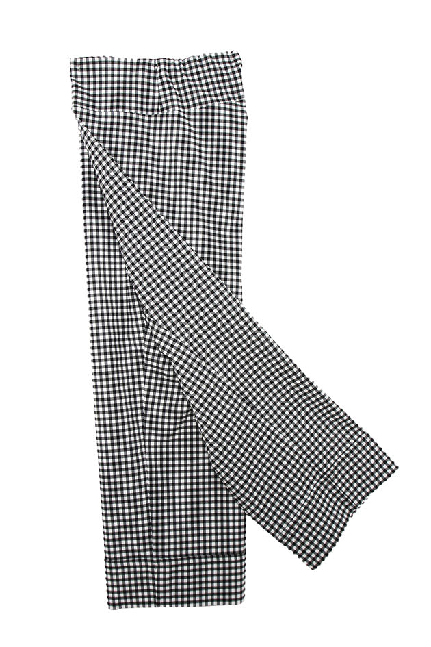 folded black white check pants white background