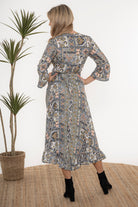long wrap dress moroccan print worn by model back view