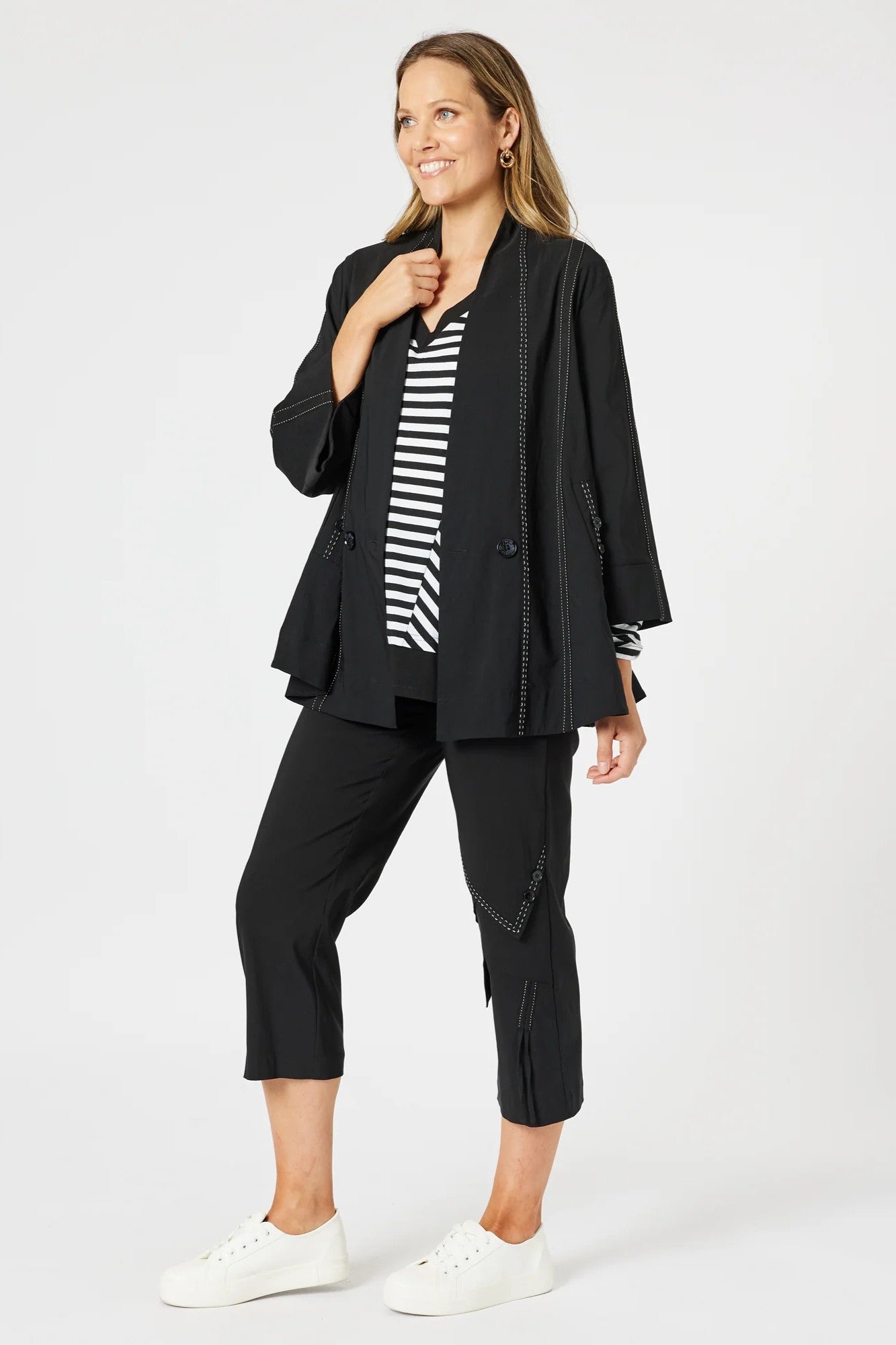 womens black jacket with white stitching details