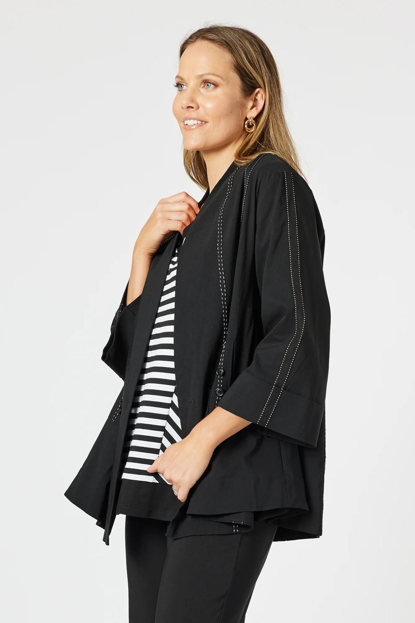 womens black jacket with white stitching details