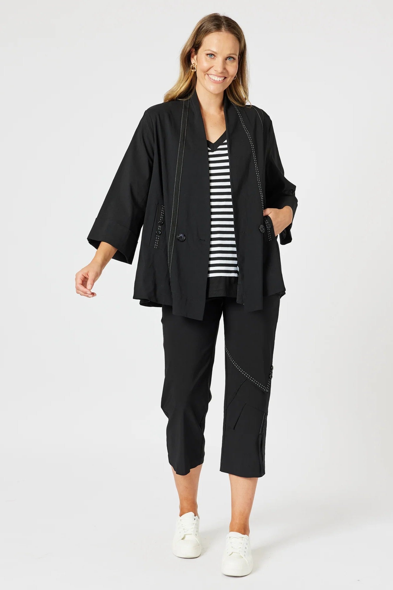 womens cropped black pant with white stitching