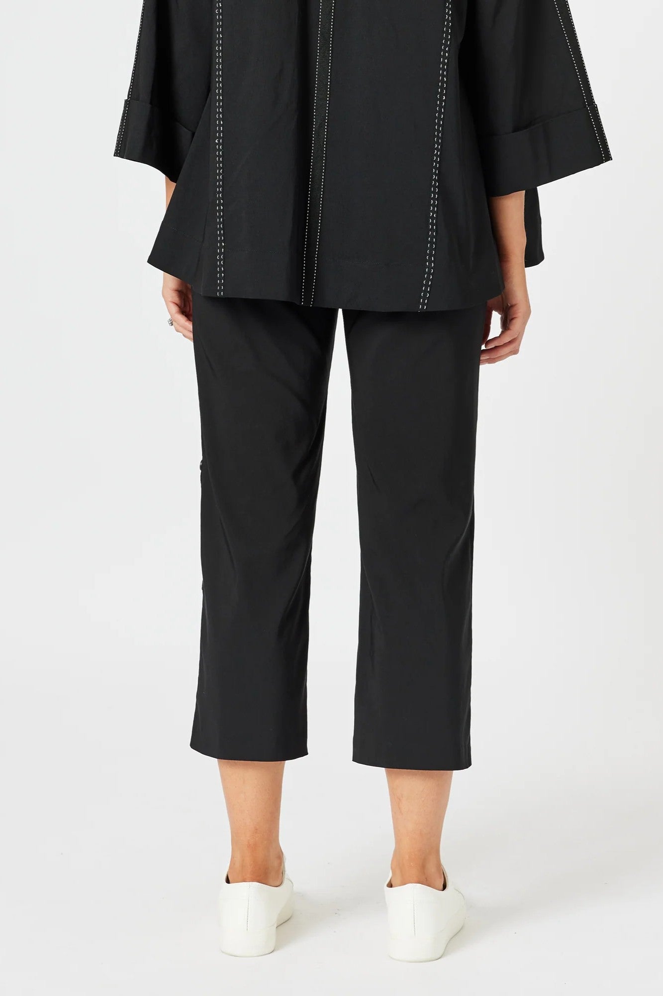 womens cropped black pant with white stitching back view