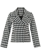 Houndstooth patterned jacket on a white background