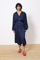 navy blue satin button through midi dress worn by model
