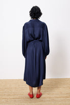 navy blue satin button through midi dress worn by model back