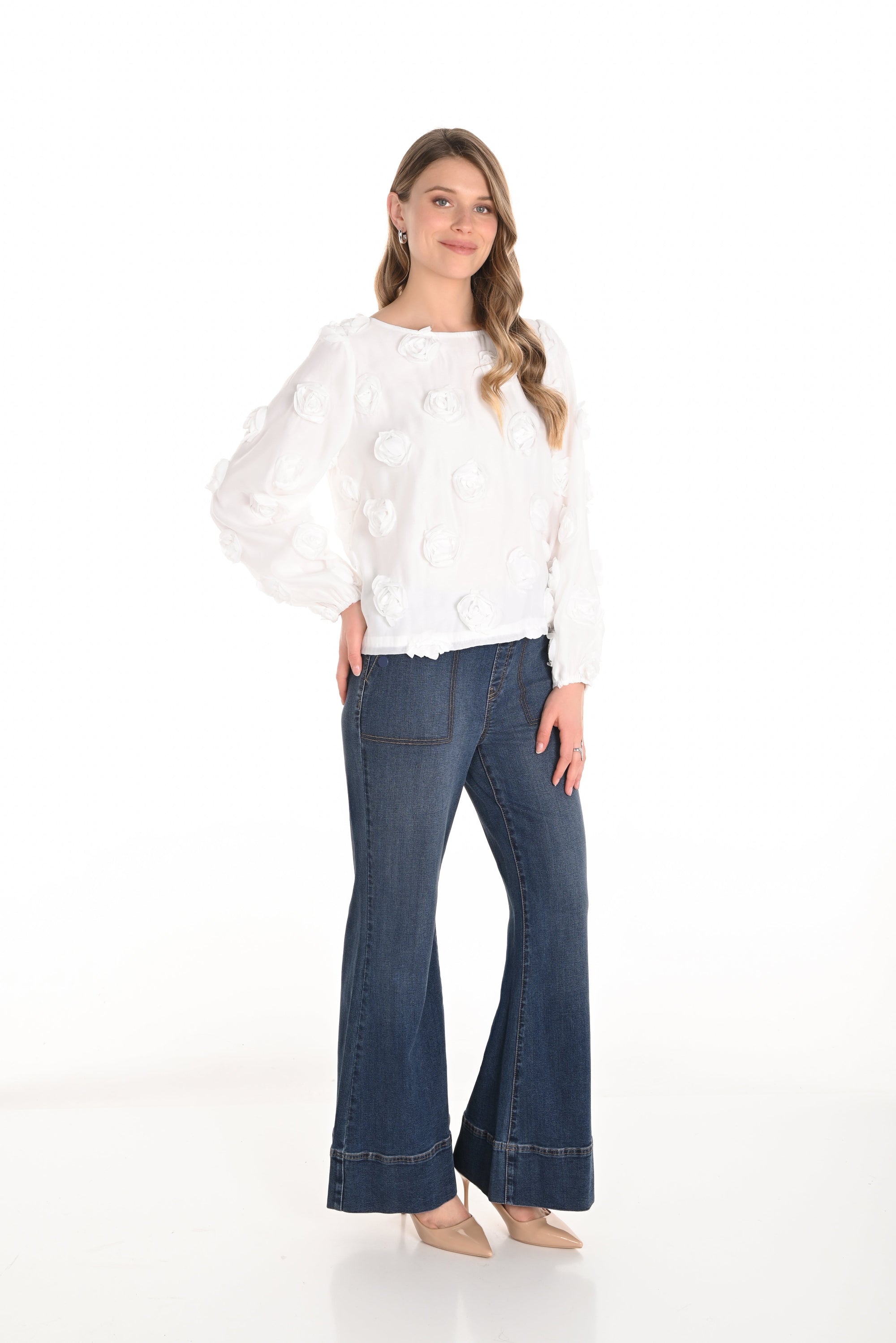 pull on jean flare pant with white blouse worn by model 