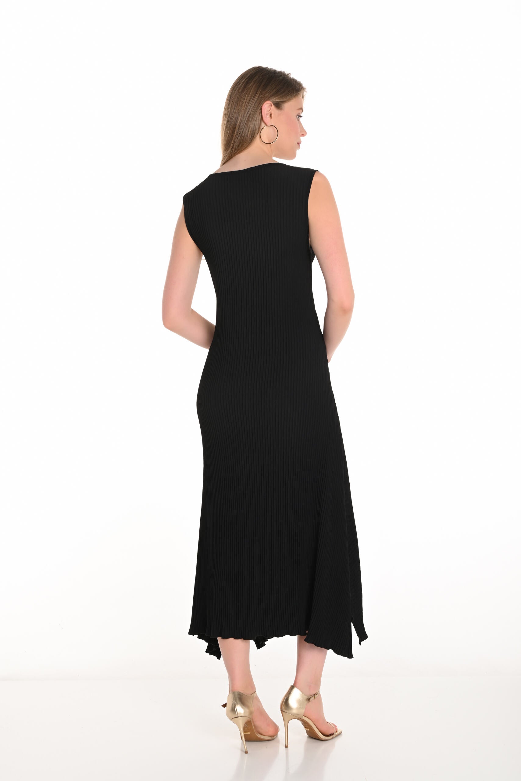 womens pleated sleeveless midi dress in black worn by model back view