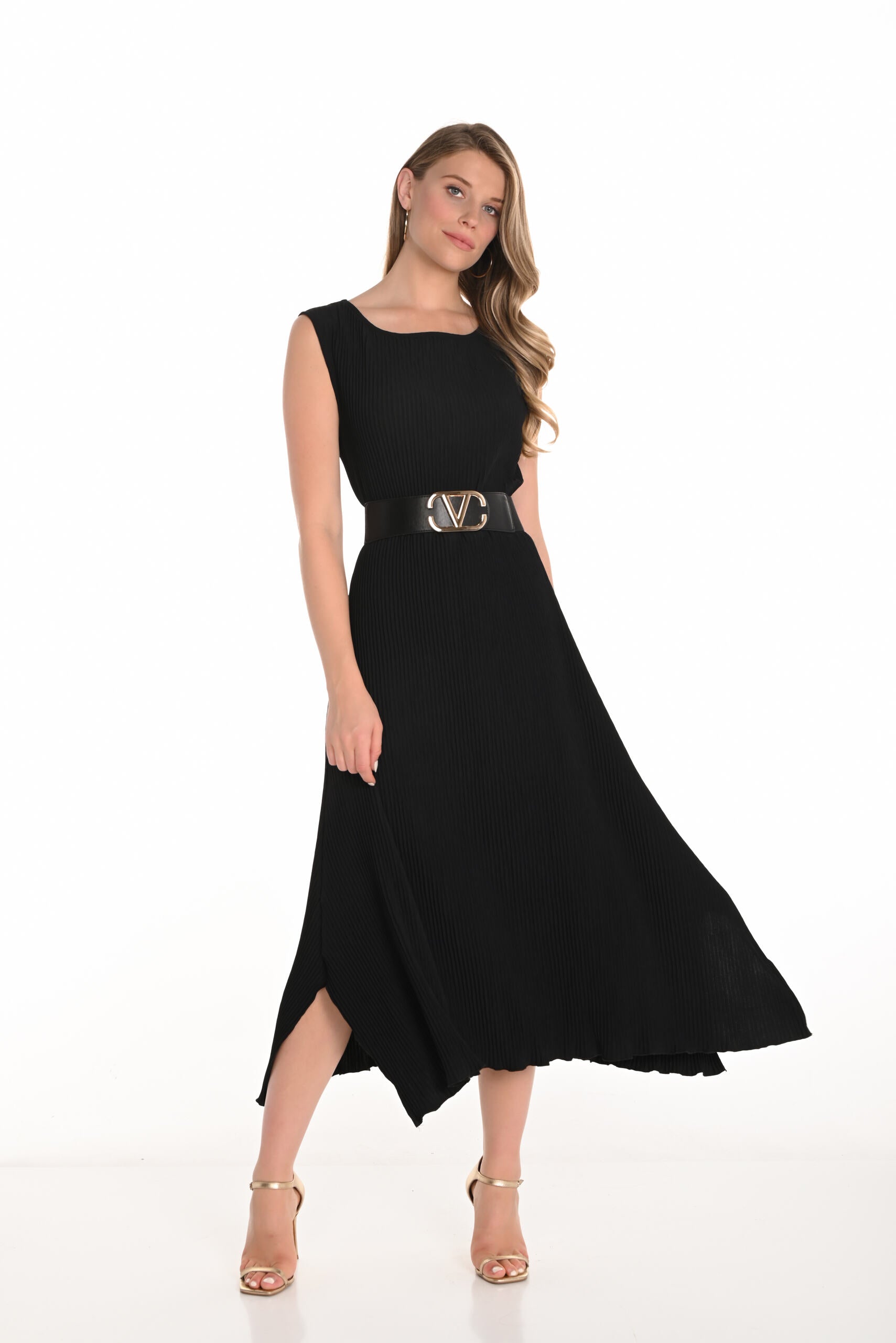 womens pleated sleeveless midi dress in black with belt worn by model 