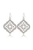 silver earrings with moroccon design clear cut white background