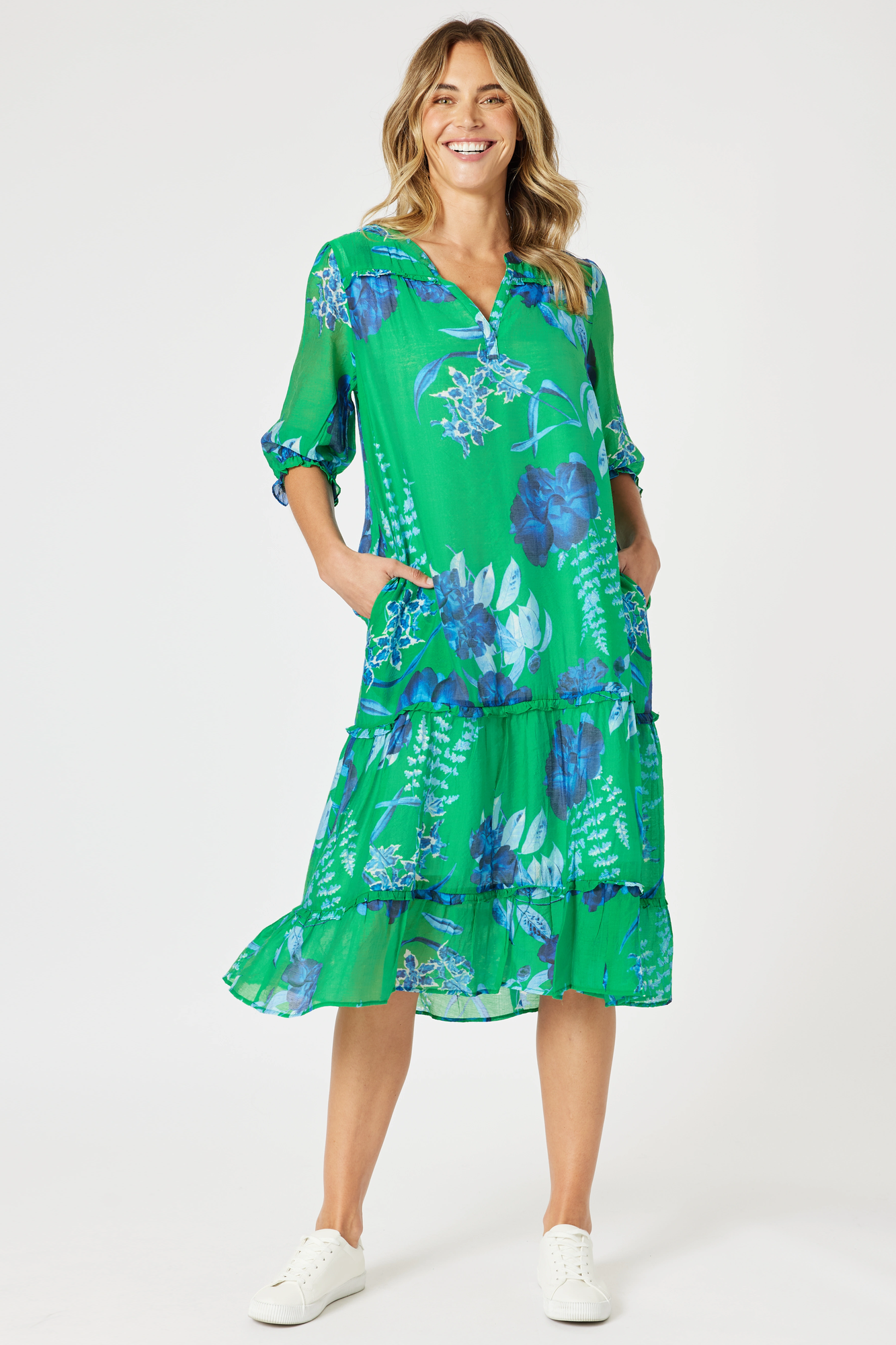 womens midi dress with soft pleating v neckline in green and blue floral print
