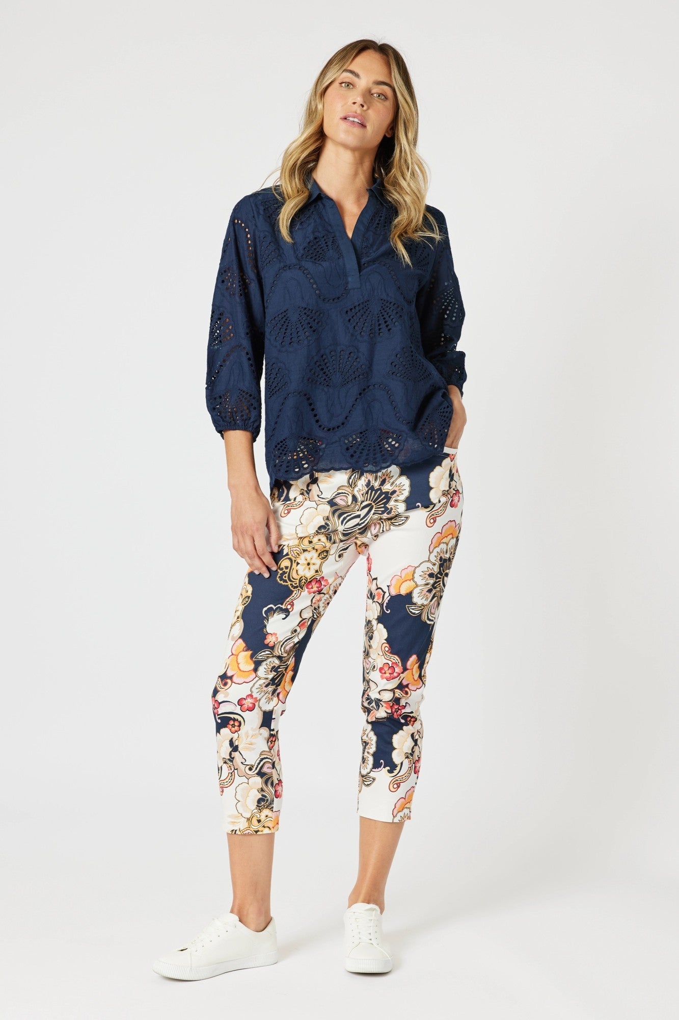 womens cropped navy multi print pant worn by model 