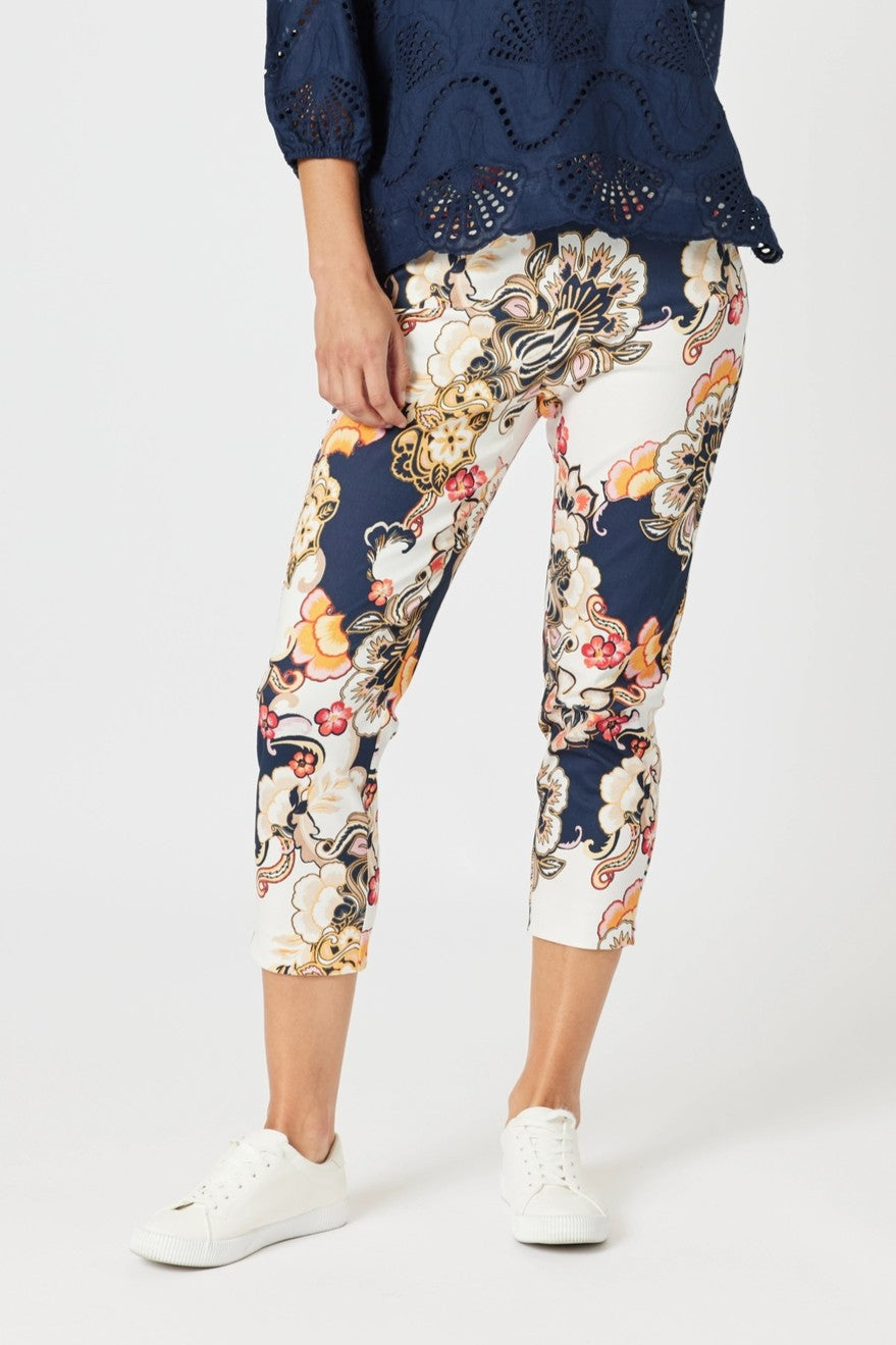 womens cropped navy multi print pant worn by model 