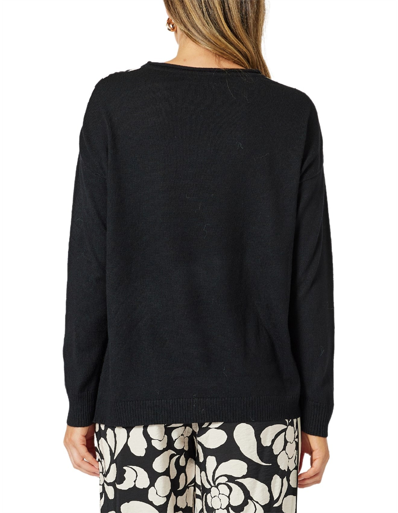 womens knit top with black and white floral contrast long sleeve back view