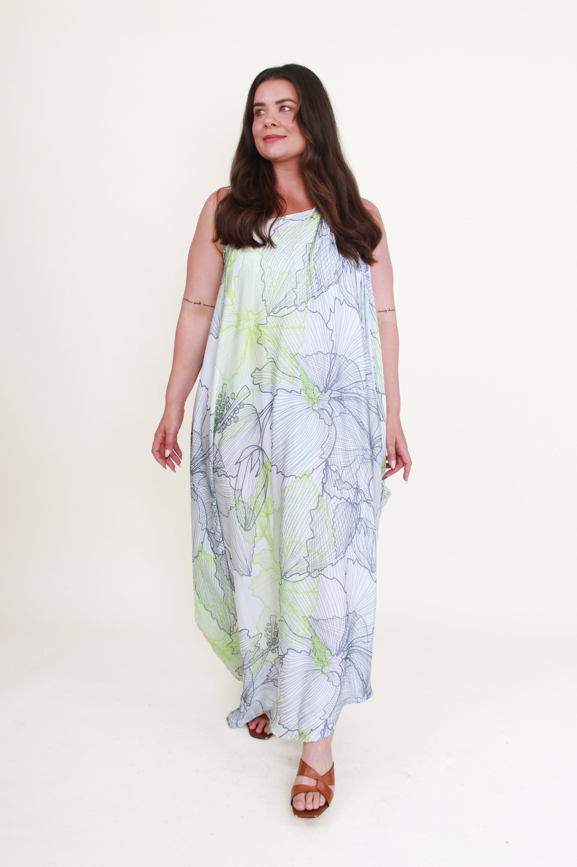 one shoulder lighmaxi dress worn by model 