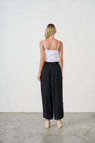 womens wide leg black pants with drawstring worn by model back view