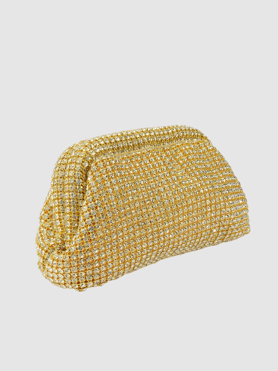 Gold clutch bag with rhinestone detailing on a light gray background