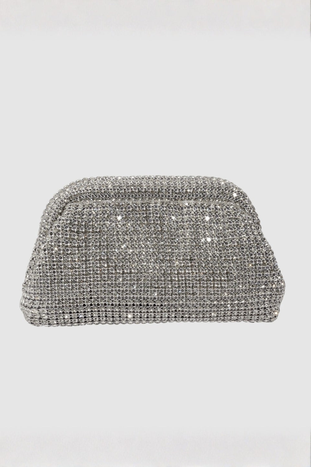 Silver clutch bag with rhinestone embellishments on a light gray background