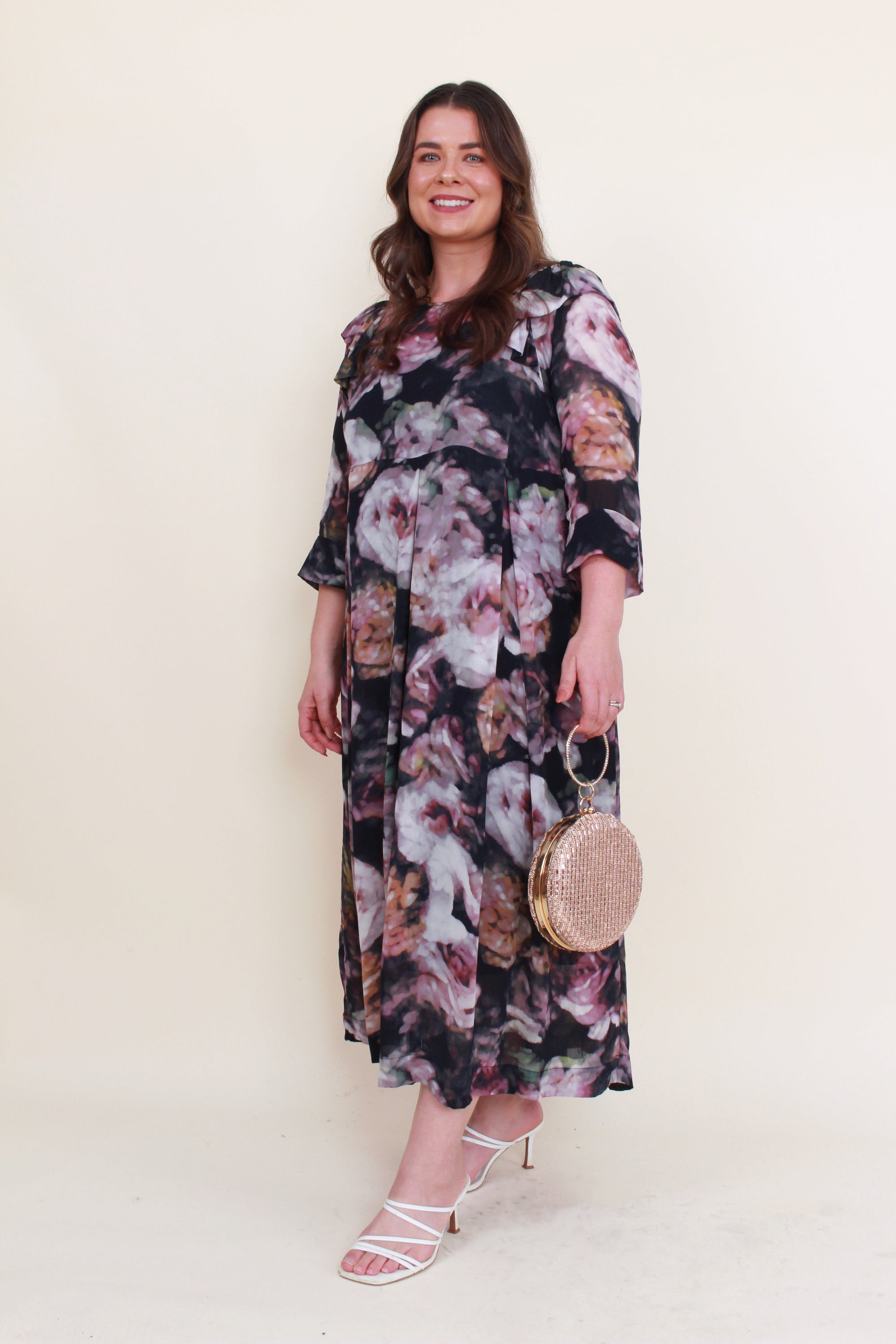 womens long dress with long sleeves pleated dark floral print worn by model