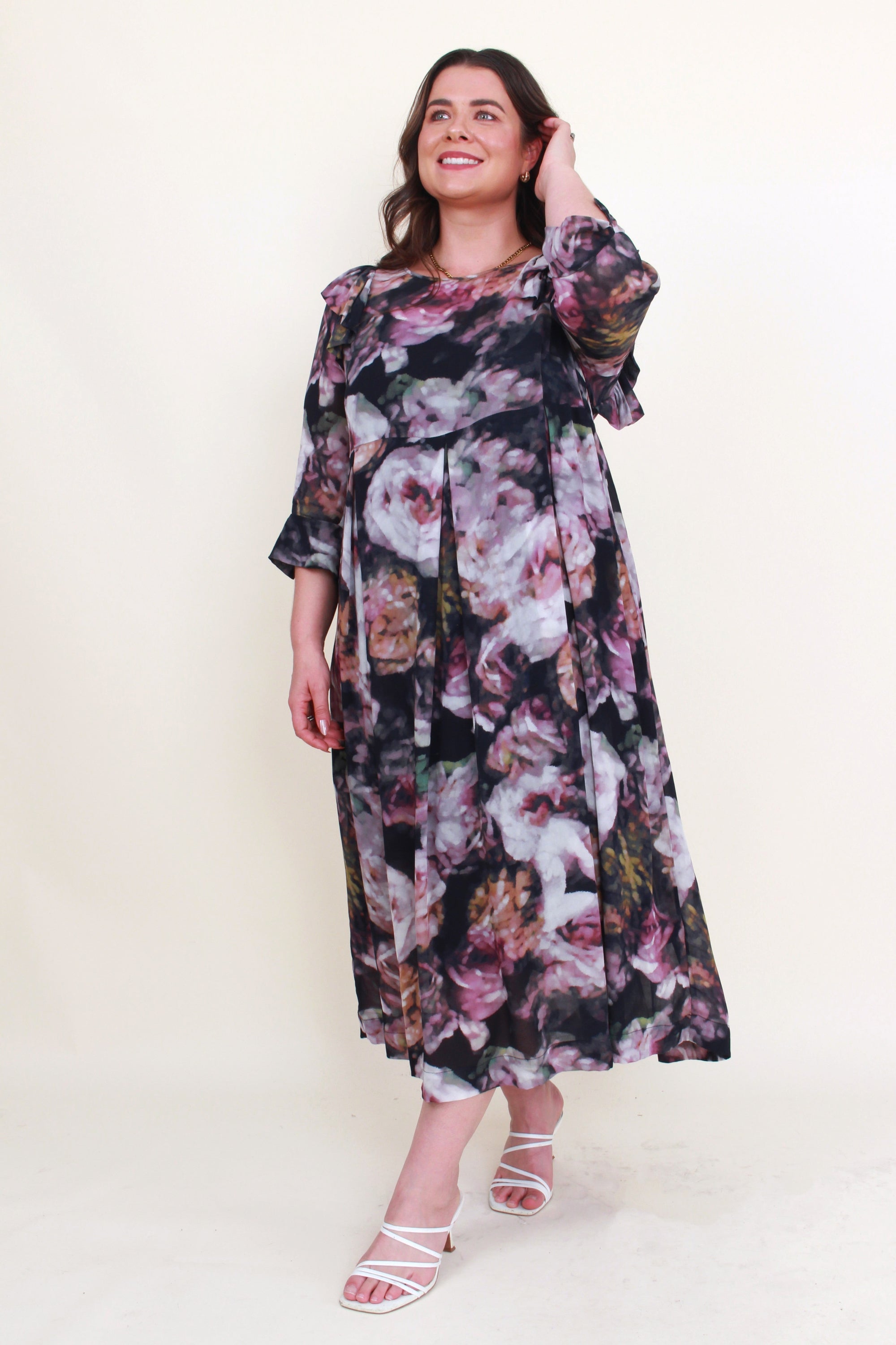 womens long dress with long sleeves pleated dark floral print worn by model