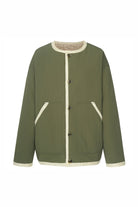 olive green and cream jacket on white background
