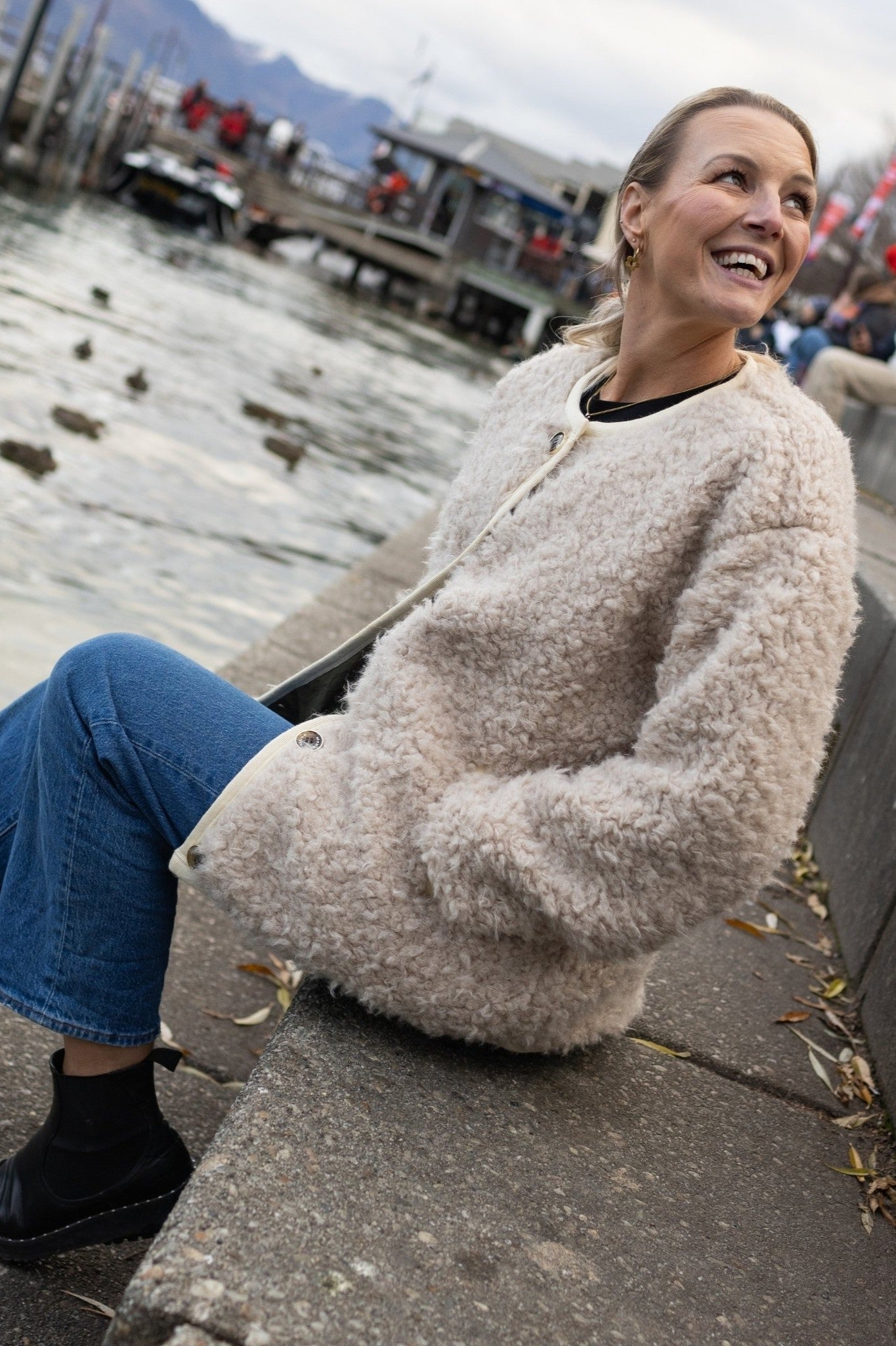 Womans shearling cream jacket worn outdoors