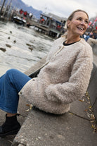 Womans shearling cream jacket worn outdoors