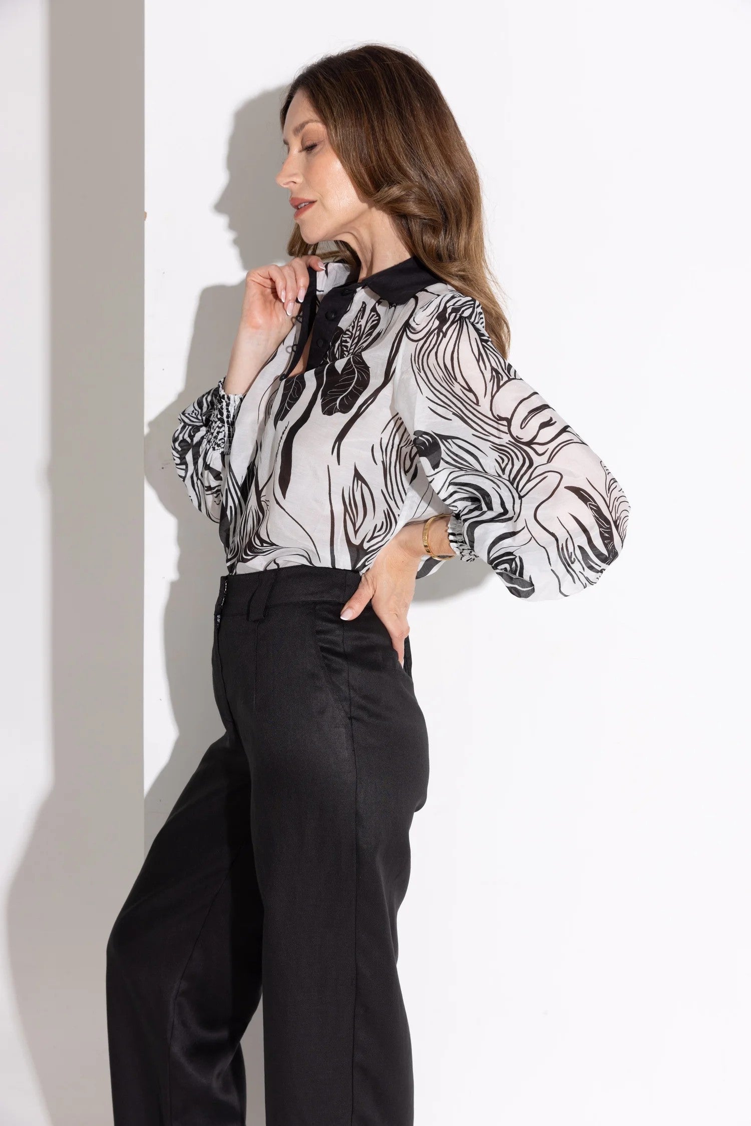womens blouse abstract floral black off white with black pants worn by model
