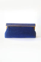 blue women's diamante clutch bag