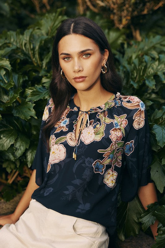 womens blouse with floral design in indigo worn by model campaign image