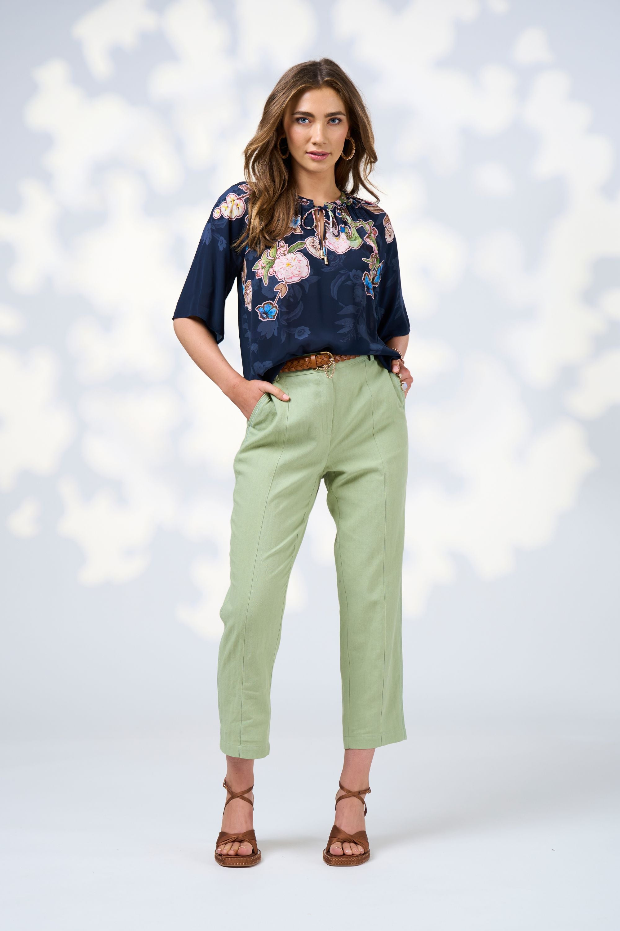 womens blouse with floral design in indigo worn by model