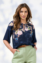 womens blouse with floral design in indigo worn by model