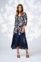 womens midi dress flowy skirt with long sleeve floral indigo worn by model