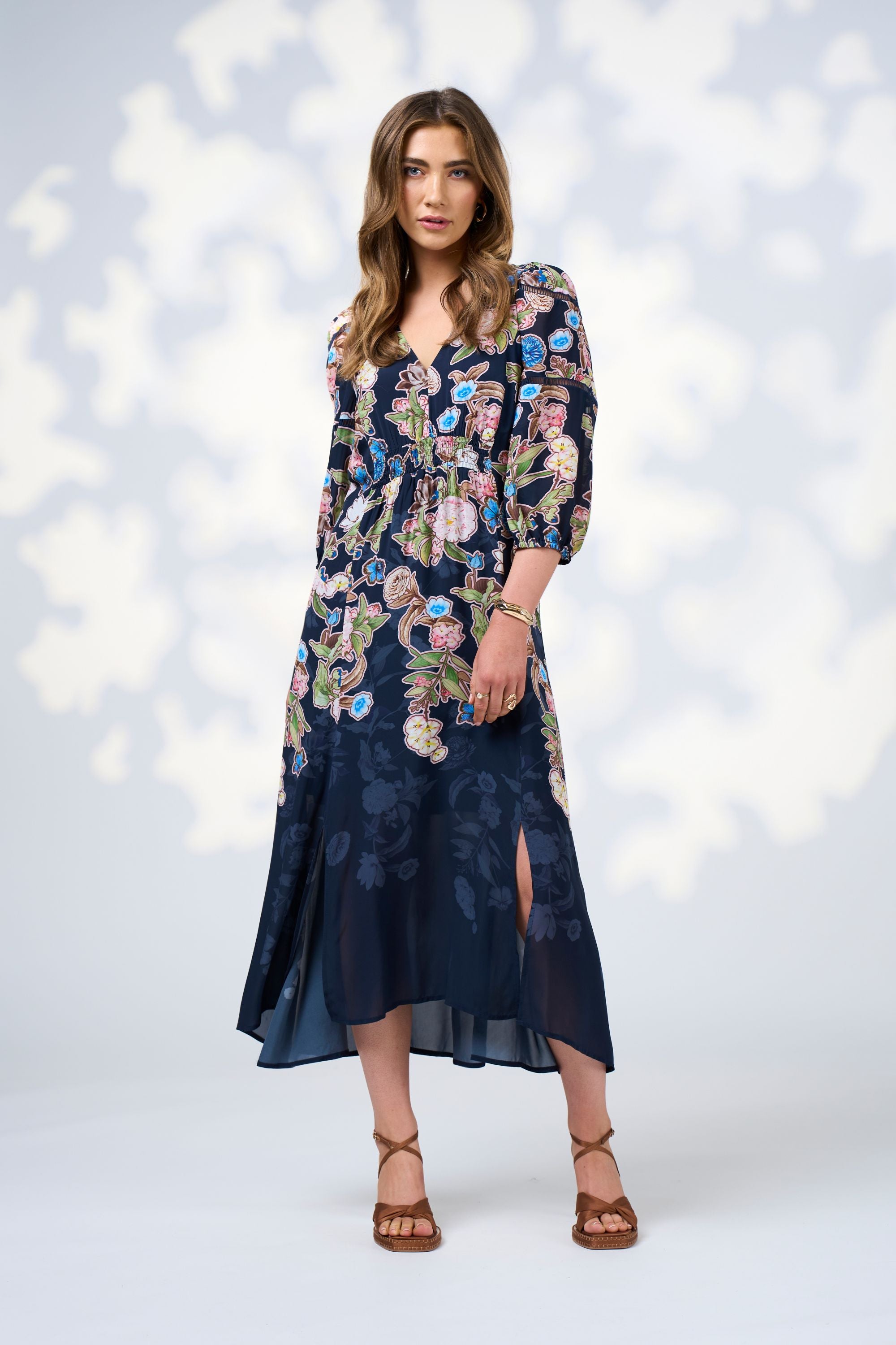 womens midi dress flowy skirt with long sleeve floral indigo worn by model