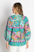 model wearing multi colour button through shirt back