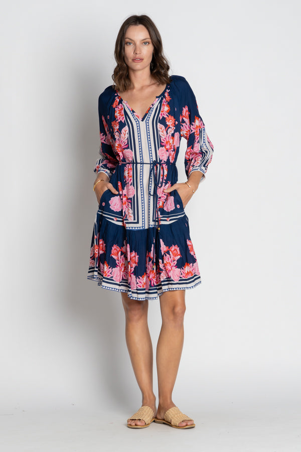 navy and pink floral midi dress worn by model 