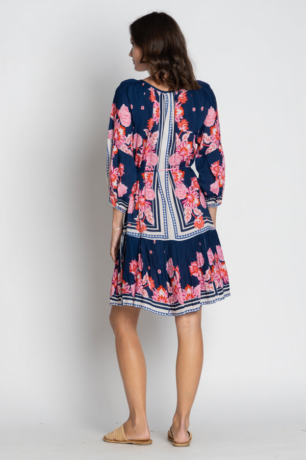 navy and pink floral midi dress worn by model back view