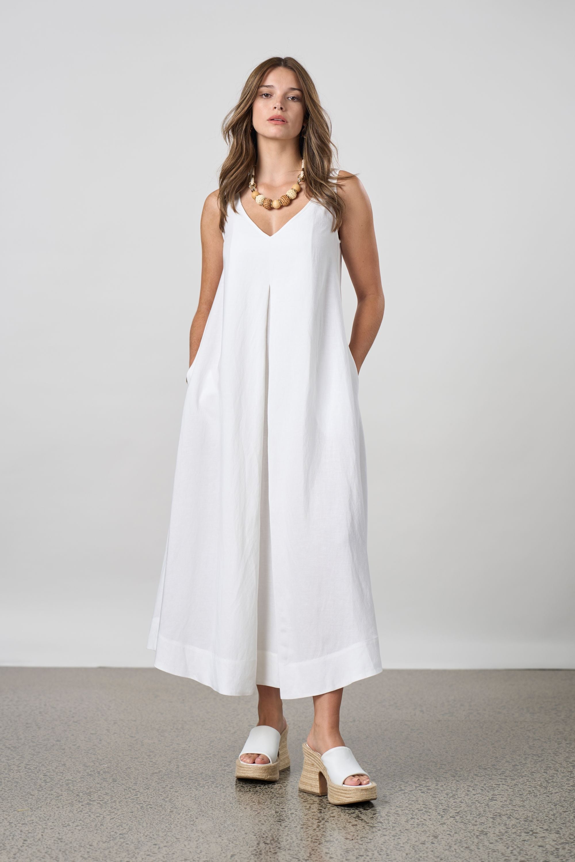 pleat maxi dress white worn by model 