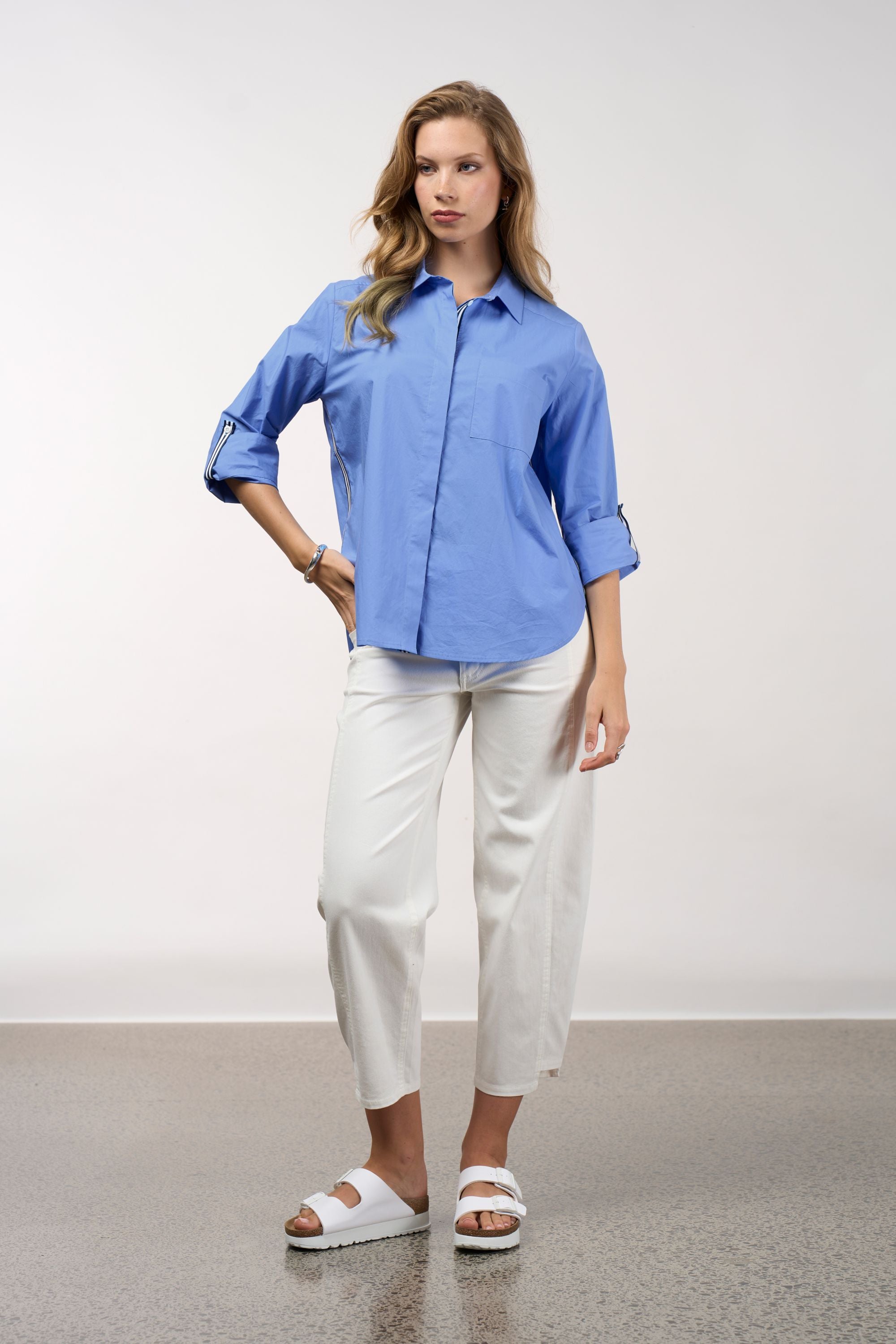 womens shirt blue with stripe trims worn by model 