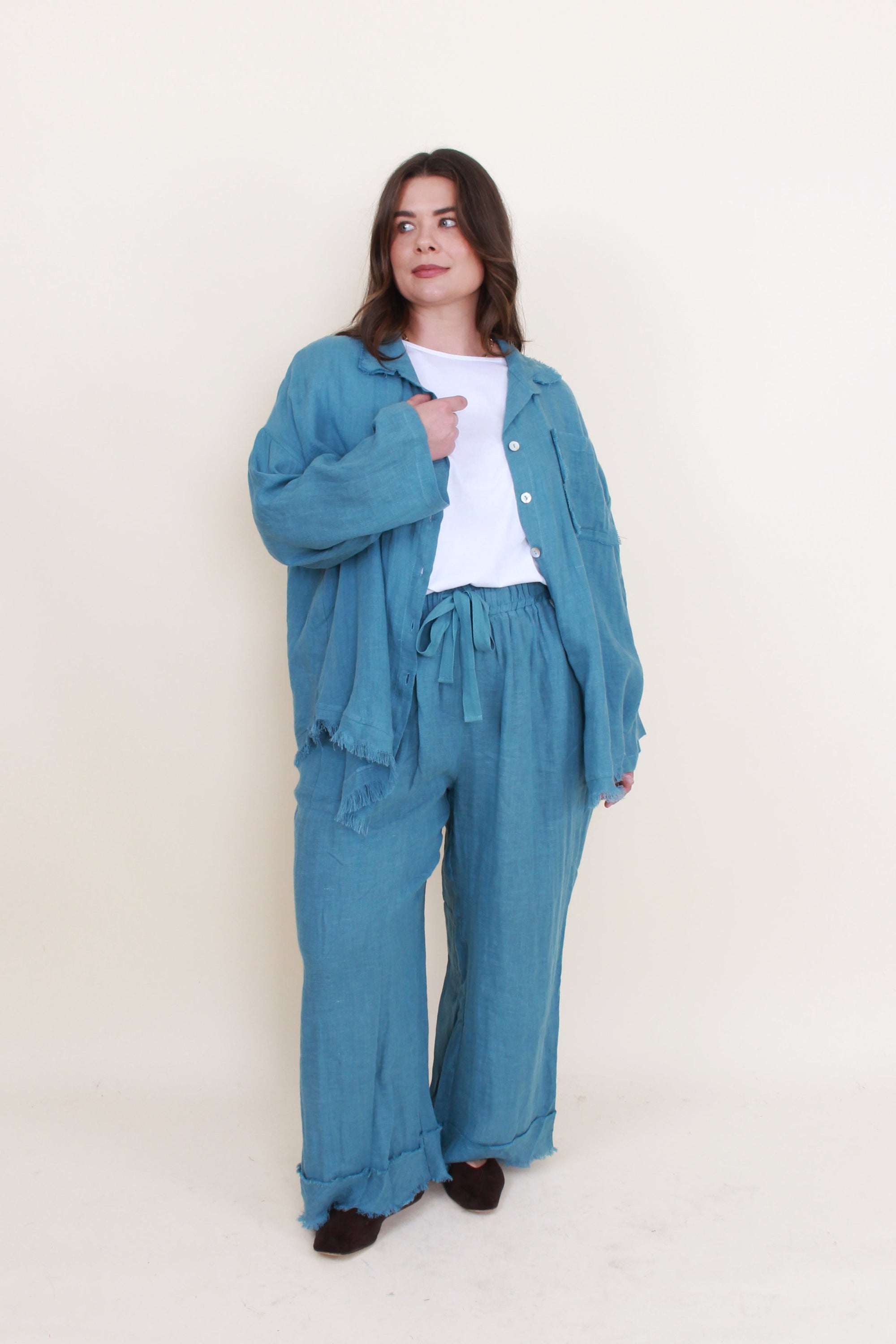 Linen frey hem shirt and pants blue worn by model 
