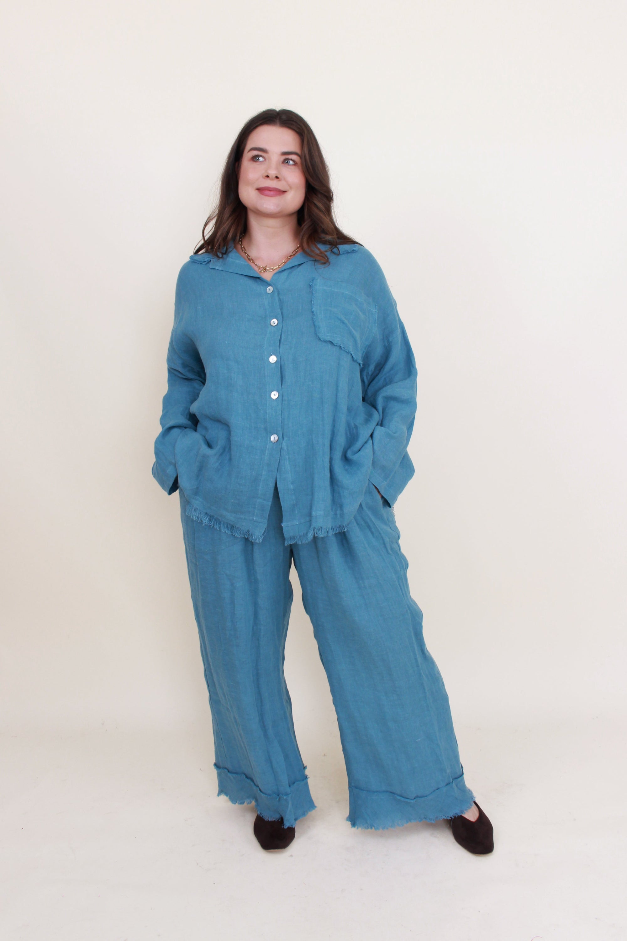blue frey hem longline shirt and pants set worn by model 