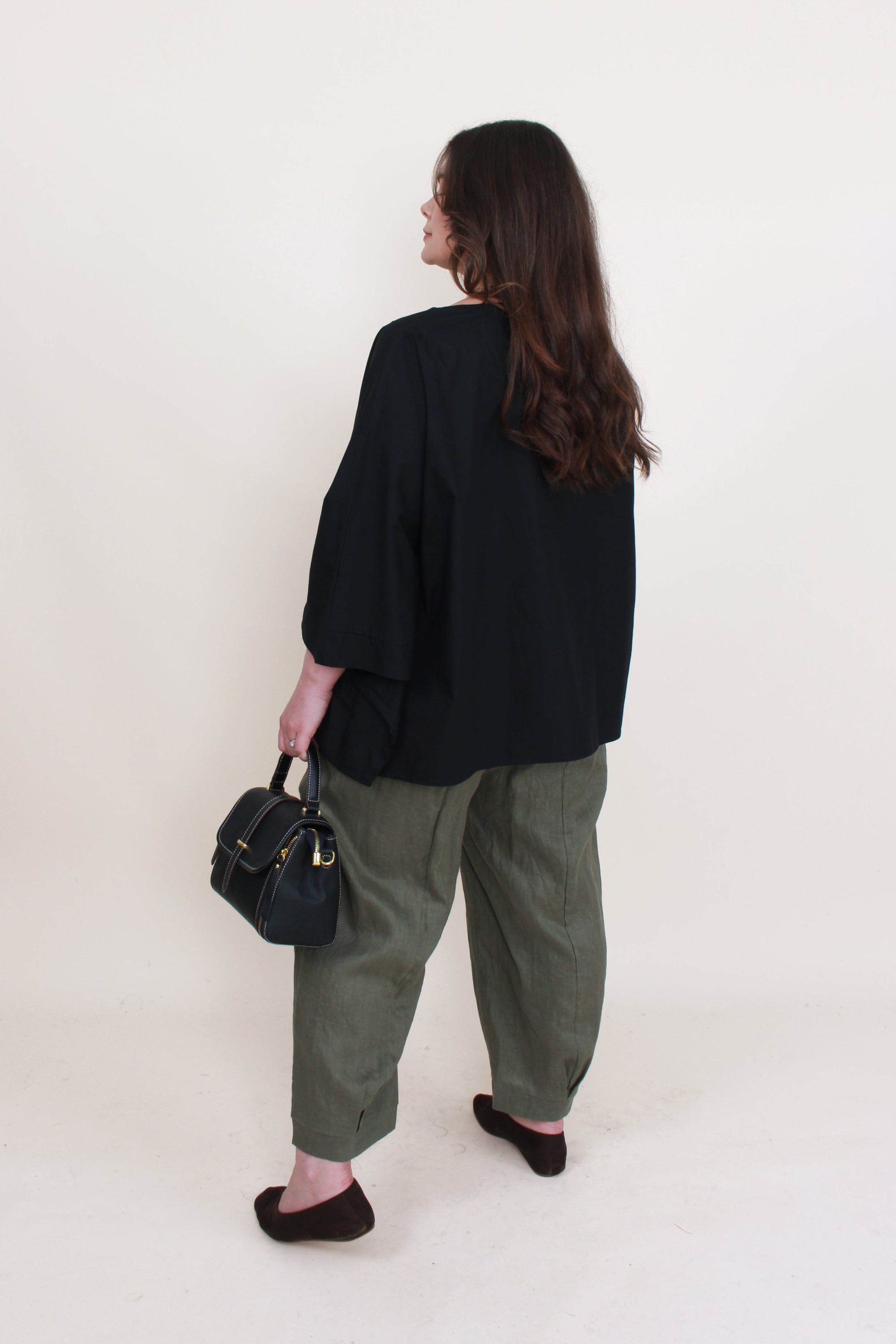 womens linen cocoon pant in khaki worn by model back view