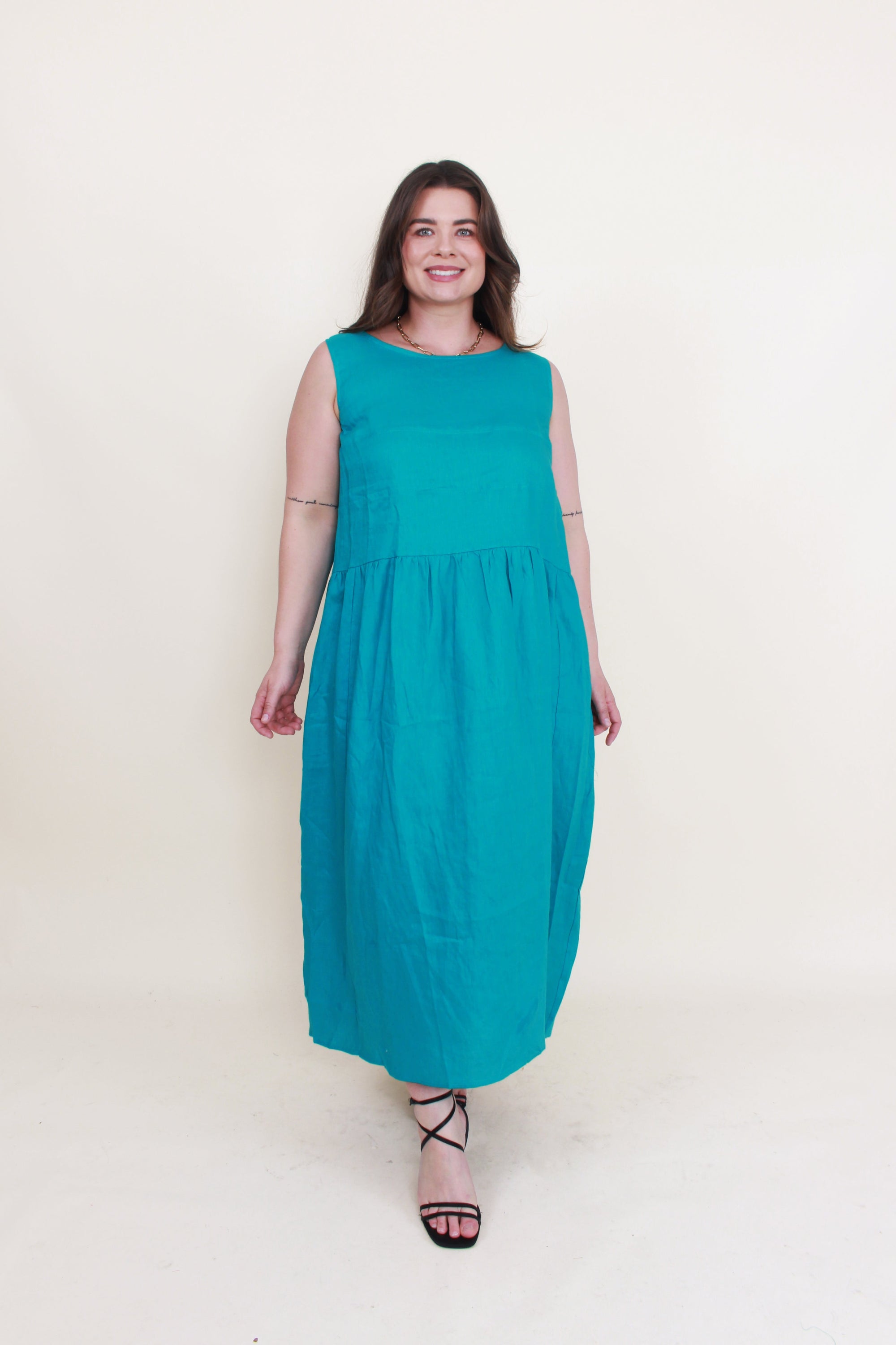 sleeveless linen midi dress jade green worn by model
