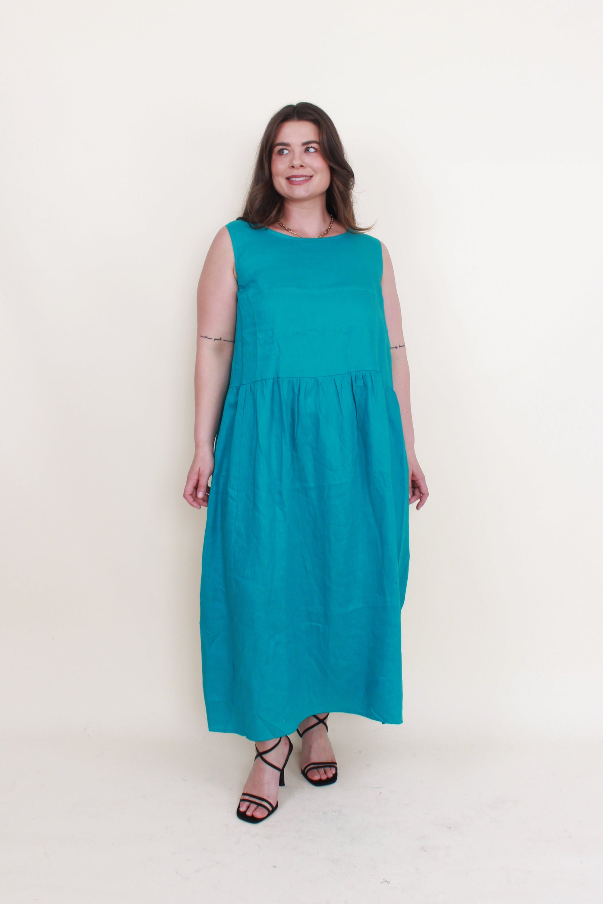 sleeveless linen midi dress jade green worn by model