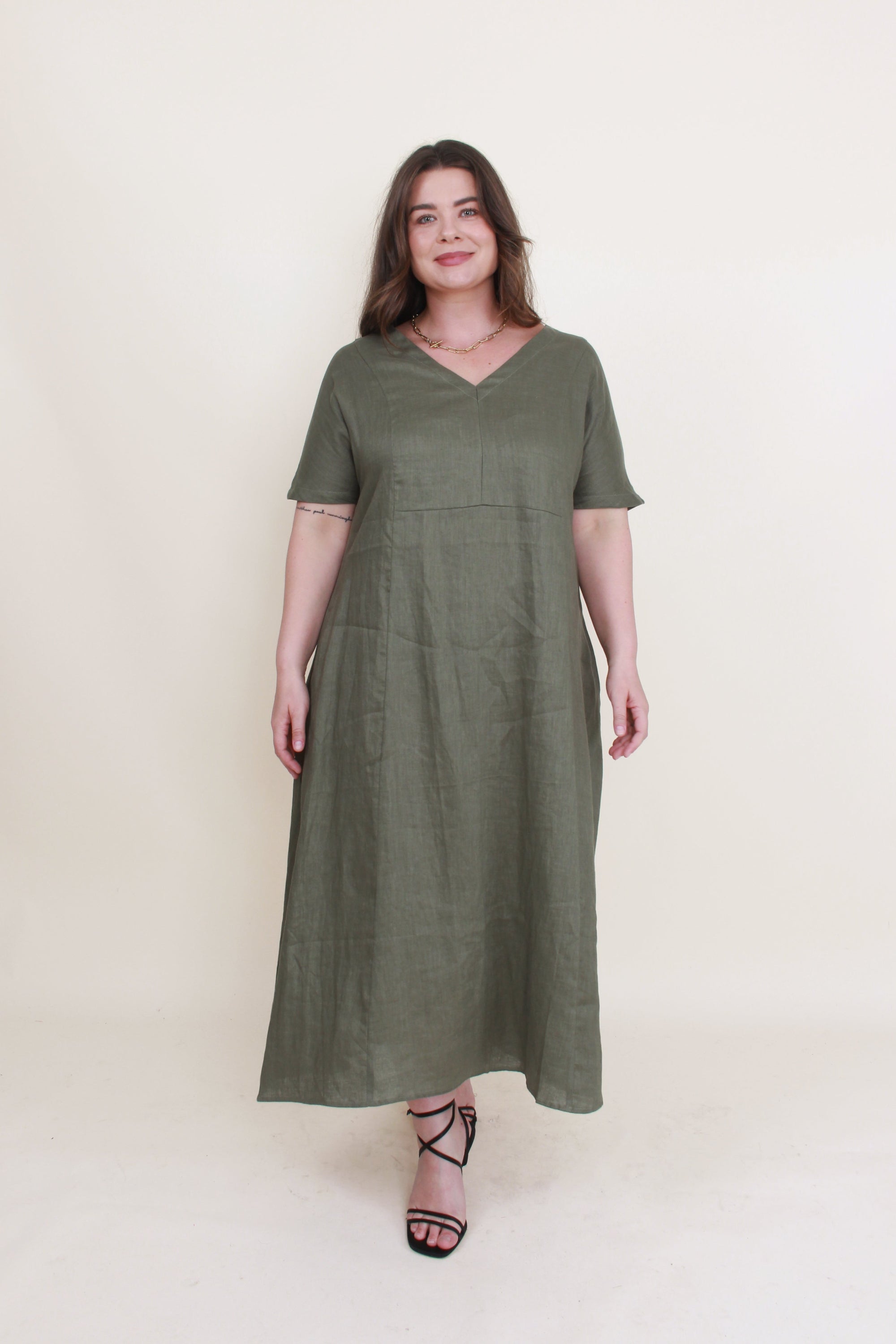 womens linen midi dress in khaki worn by model 