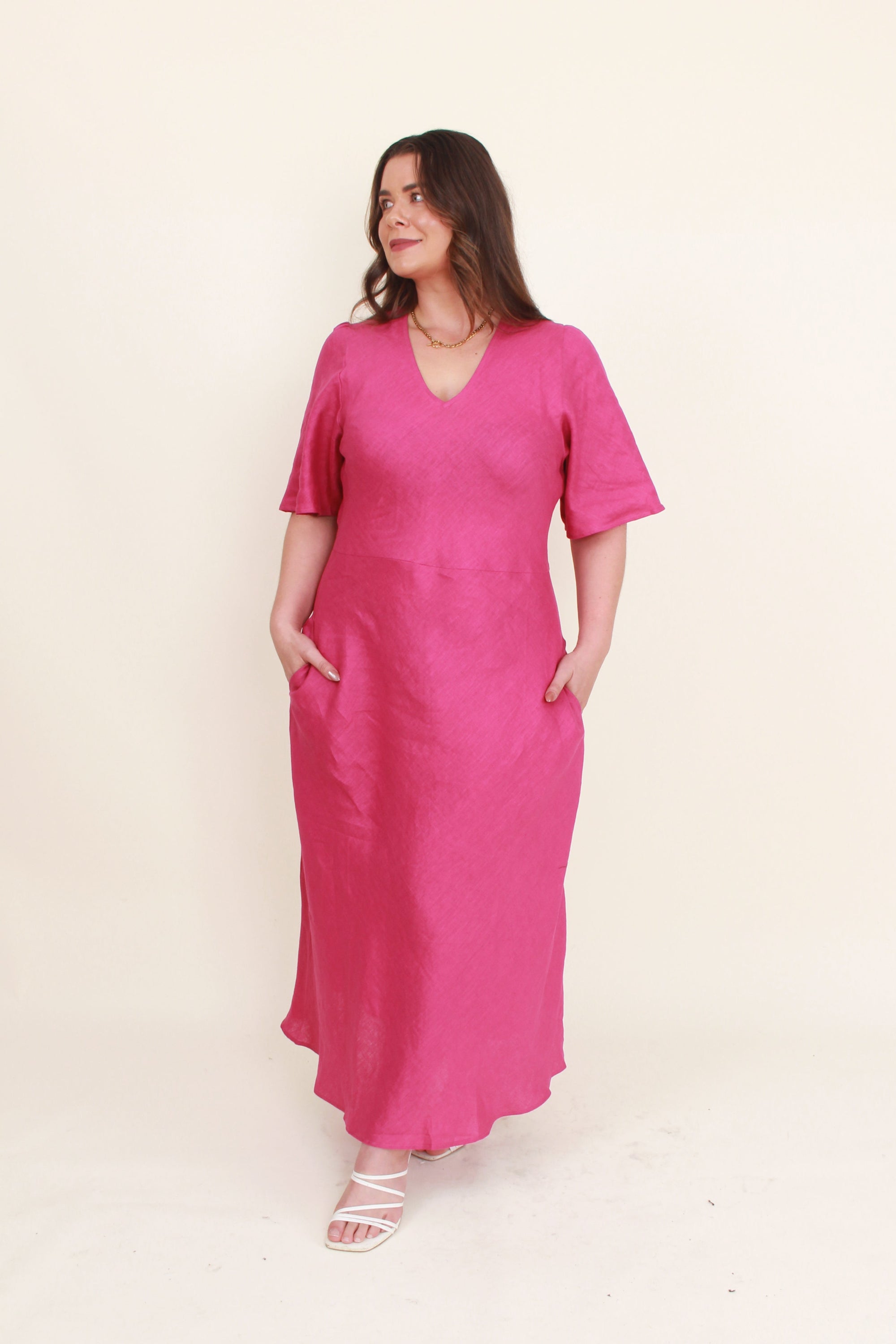 fuchisa midi dress with half sleeve worn by model